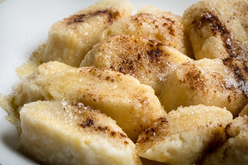 Lazy dumplings with cinnamon and sugar.
