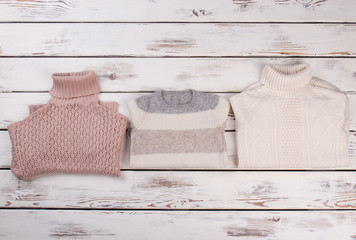 Fototapeta na wymiar Set iof hand knitted pullovers
