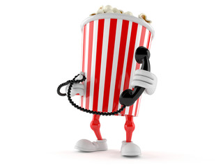 Popcorn character holding a telephone handset