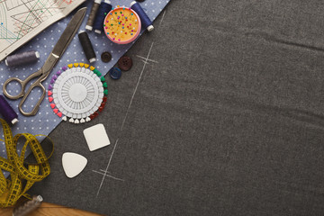 Workspace of fashion designer, top view