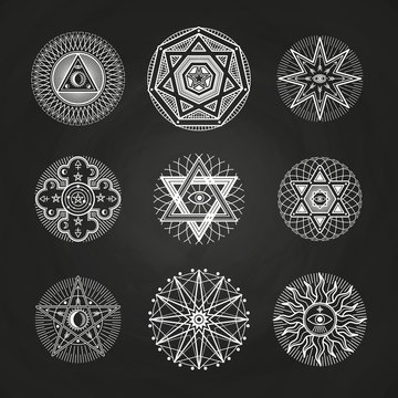 White mystery, occult, alchemy, mystical esoteric symbols on blackboard