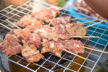 Pork skewers grilled on charcoal