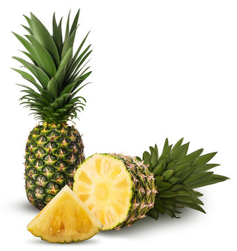 Pineapple fruit whole and cut in half and slice with green leaves