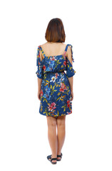 back view of standing young beautiful  woman.  girl  watching. Rear view people collection.  backside view of person.  A girl in a colorful dress is worth her hands down.