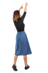 Back view of  pointing woman.