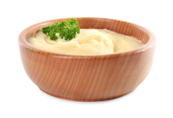 Bowl with mashed potatoes on white background