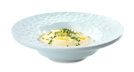Plate with mashed potatoes on white background