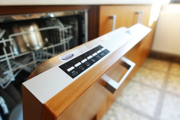 Open built-in dishwasher machine
