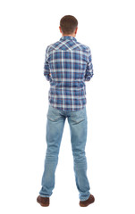 Fototapeta premium Back view of man in jeans.