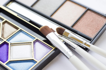 Eye Make Up Beauty Fashion Concept. Daily and evening shimmer eye shadow palettes and professional...