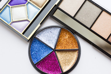 Eye Make Up Beauty Fashion Concept. Daily and evening shimmer eye shadow palettes and luxurious...