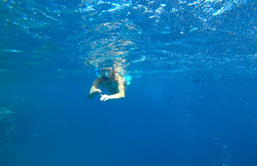 girl and snorkeling