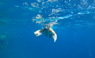 girl and snorkeling