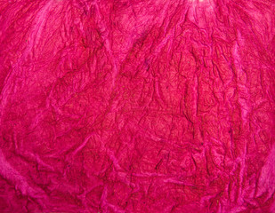 Magenta crumpled handmade paper texture