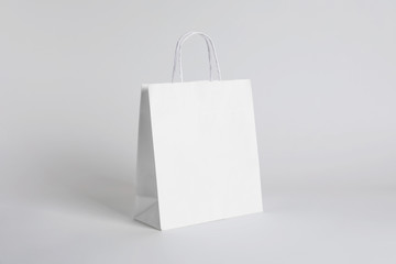 Paper bag on white background. Mockup for design - 190119484