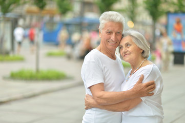 Senior couple on city street