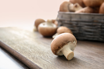 Cremini mushroom on wooden table
