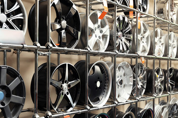 Rack with car wheels in automobile store