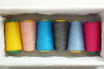 Set of color sewing threads in box, top view