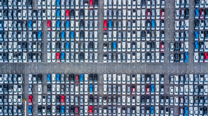 Aerial view new car lined up in the port for business dealership import and export, Top view new...