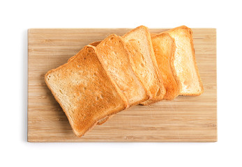 Wooden board with toasted bread on white background