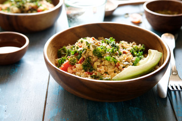 Quinoa salad with kale, cherry tomatoes and pumpkin seeds
