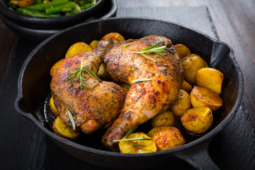 Baked chicken legs with potatos
