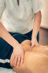Fototapeta na wymiar Lower back massage