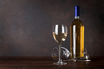 Fototapeta na wymiar White wine bottle and glass