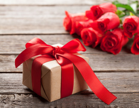 Valentines day gift box and red roses