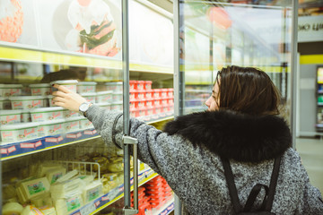 woman get cheese from the fridge