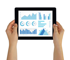 Hands holding digital tablet computer with graphs and charts elements on screen. Isolated on white....