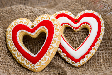 Gingerbread heart cookies on a rustic wooden background. Valentine's Day concpt. Free space copyspase for your text