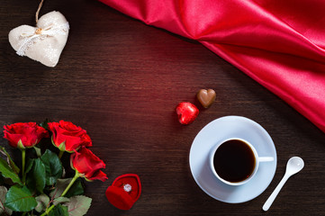 Happy Valentines Day romantic background with wedding ring, rose flowers, cup of coffee and chocolate candy