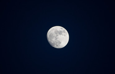 Blue moon on the dark blue sky