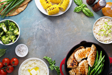 Grilled chicken with green beans in a skillet