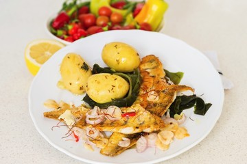 Roasted zander fish,boiled potato, wakame and salad.