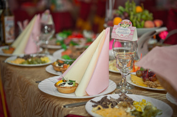 Meals with cold snacks on the festive table 482.