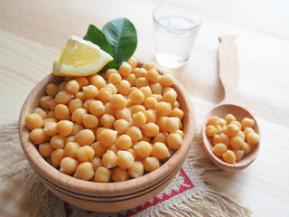Chickpeas served in a wooden dish
