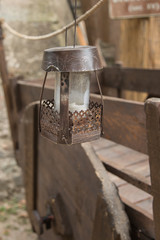 Old Iron Hanged Lamp, Wooden Brown Cart in background