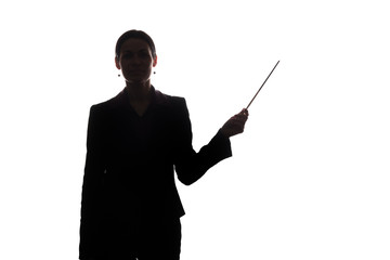 Young woman in suit shows pointer forward, side view - silhouette