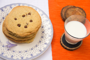Chocolate chips cookies and milk