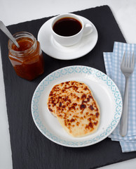 Cheese, cloudberry jam, and coffee