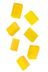 Falling sliced mango isolated on white