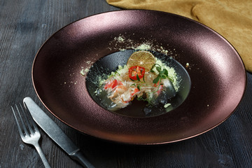 National cuisine. Russian traditional dish - Holodets. Homemade jellied meat with garlic and spices garnished with mustard and spring onion. The best food for Russian vodka.