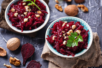 Healthy vegan beetroot salad with walnuts
