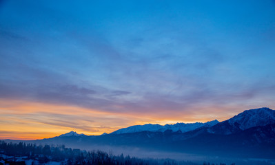 Sunrise over snow Tatry mountains in winter time.