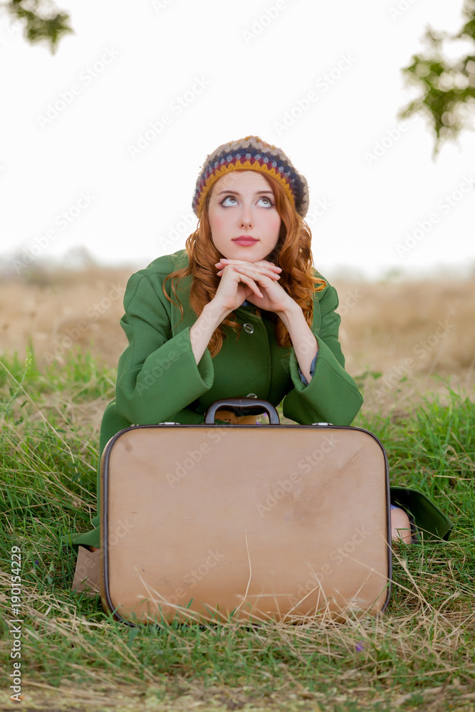 Sticker portrait of adult girl in green coat with suitcase