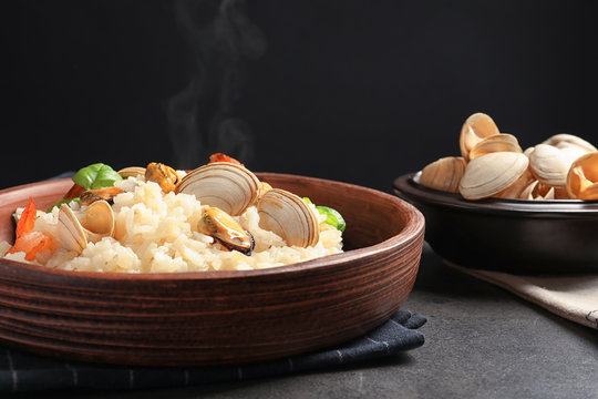 Dish with delicious seafood risotto on  table