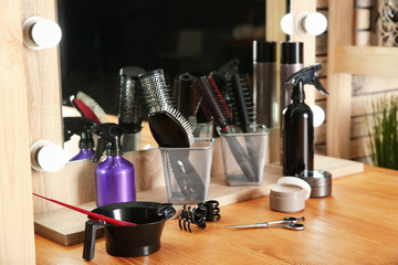 Professional hairdresser set on table in salon